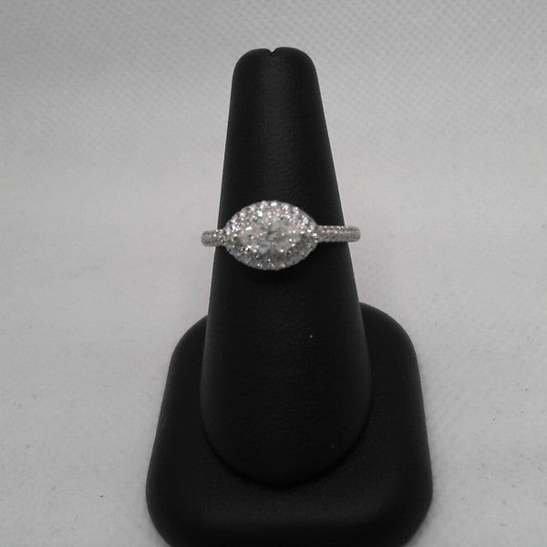 Lady's White 14 Karat Halo Engagement Ring