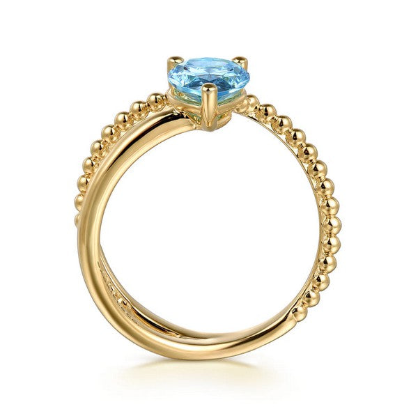 14K Yellow Gold Bujukan And Blue Topaz Bypass Ring