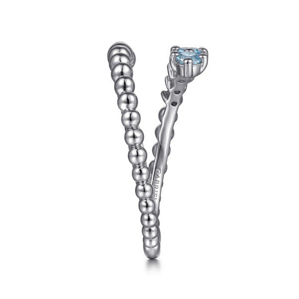 Sterling Silver Bujukan and Blue Topaz Bypass Ring